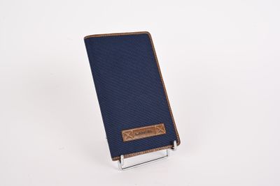 LANCEL. Porte chequier et porte carte en toile monté sur cui…