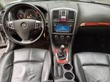 a picture of a car dashboard with a steering control