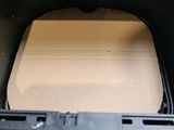 the interior of a car with the door open showing the inside of it