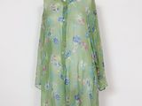 green floral shirt dress with long sleeves on mannequin mannequin mannequin mannequin mannequin mannequin mannequin mannequin