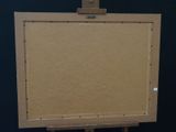 a picture of an easel with a picture on it