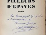 the front cover of a book with a handwritten title