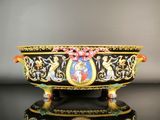 an image of a decorative bowl on a black surface