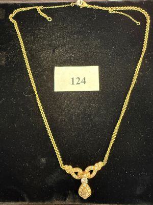 1 collier en or jaune 18 K (750°/°°) serti d'un diamant en f…