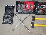many tools that are laying out on the floor