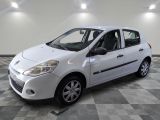 a picture of a white car parked in a garage