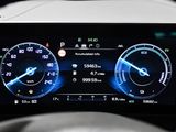 the dashboard of a car with a digital display on it