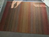 a rug on the floor in a living room