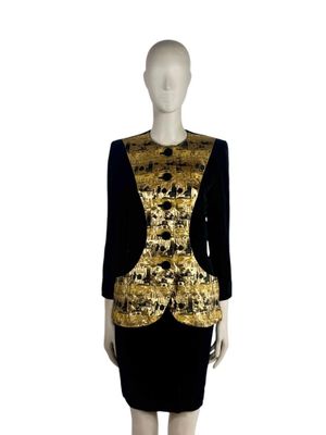 an image of a mannequin dress with a gold and black design