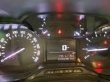 a close up of a car dashboard with a speedometer