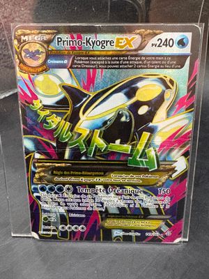 a close up of a box of pokemon cards on a table