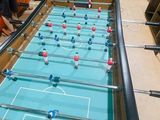 a foo foo table in the middle of a room full of people