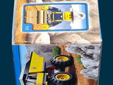 a box that has a toy train inside of it