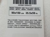 a label on the back of a white shirt