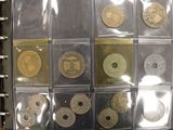 a picture of a book with a bunch of coins inside of it