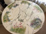 a marble table with a bunch of cards on top of it