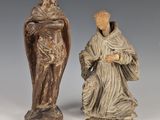 paire de figurines sculptées représentant un homme et une femme