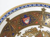 a plate with a design on it on a table