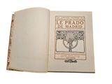 an open book with a picture of a tree on it