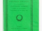 a green book with a wreath on the cover