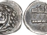 une pièce d'argent portant l'image d'un homme