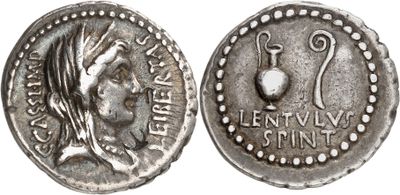 a silver coin with an image of a woman on it