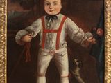 portrait of a boy in a white suit with red suspends and a dog
