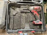 a tool in a case with a hammer and other tools in it