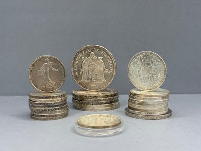 five coins stacked on top of each other on a table
