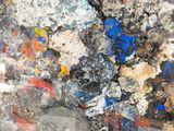 a picture of a close up of a wall with paint on it