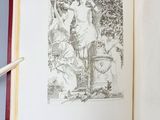 an open book with a drawing of a man and a woman in a garden