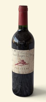 a bottle of wine that is sitting on a table