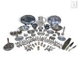 a lot of silver items that are on the table