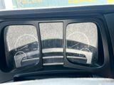 two different gauges on the dashboard of a car