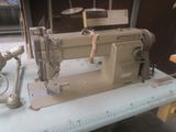 a sewing machine that is sitting on a table