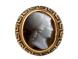 a picture of a picture of a lady in a gold frame