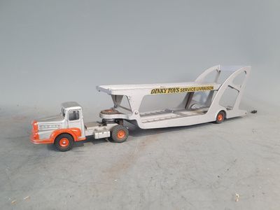 a toy truck with a crane on the back of it