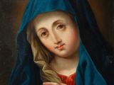 a painting of a woman holding a book in her hands