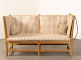 an image of a couch with a pillow on it