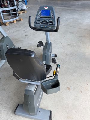 an image of a stationary exercise bike in a garage