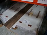 a stack of boxes that have been wrapped in plastic