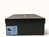 a black shoe box with a blue label on it