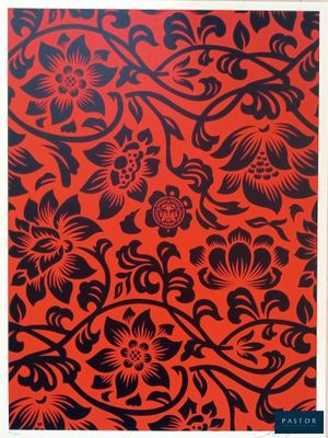 un imprimé floral rouge et noir sur fond blanc