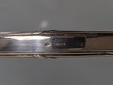 a close up of a knife on a table