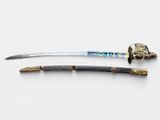 two different types of swords on display on a white surface