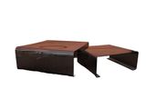 two brown ottomans sitting next to each other on a white surface