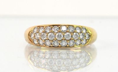 Bague en or jaune 375/1000 et pierres blanches