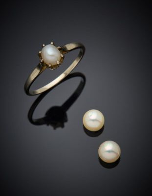 a pearl and gold ring and earring set