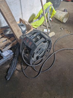 an image of a pile of tools and tools in a garage
