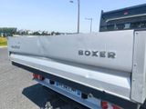 the back end of a truck with the word boxer written on it